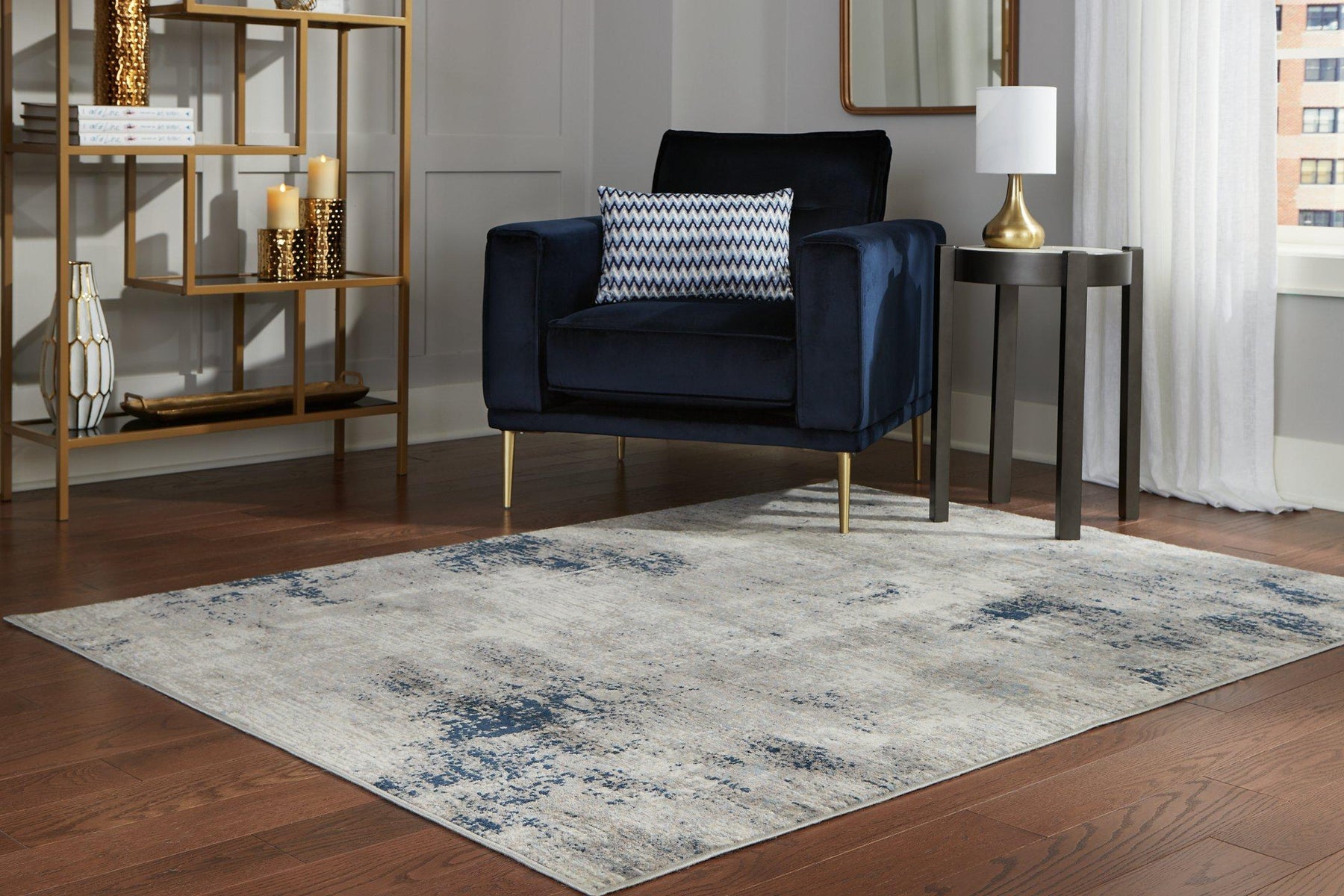 Area rug with rug pad under a living room chair - Haley Furniture & Appliances (San Augustine, TX)