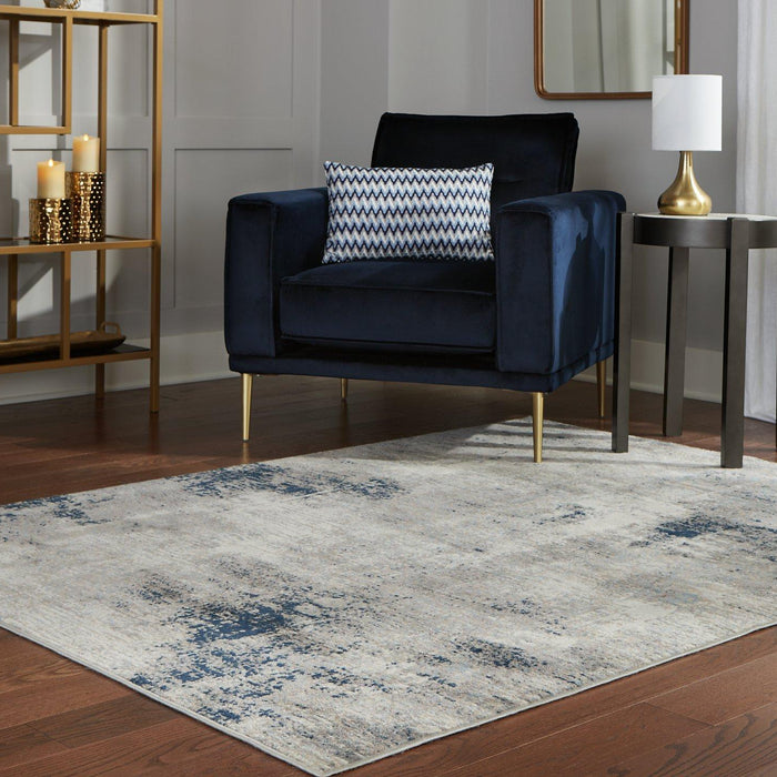 Area rug with rug pad under a living room chair - Haley Furniture & Appliances (San Augustine, TX)